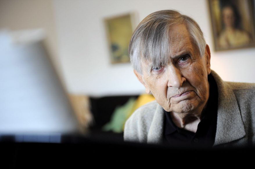 FILE - In this Oct. 9, 2008 file photo, Finnish composer Einojuhani Rautavaara is pictured at his home in Helsinki. Einojuhani Rautavaara, arguably Finland’s most famous classical composer since the era of Jean Sibelius, has died on July 27, 2016 at the age of 87. Rautavaara produced eight symphonies, seven operas, 14 concertos and dozens of other orchestral and vocal compositions. He achieved international fame with his seventh symphony, “Angel of Light,” in 1994. (Mikko Stig/Lehtikuva via AP, file)