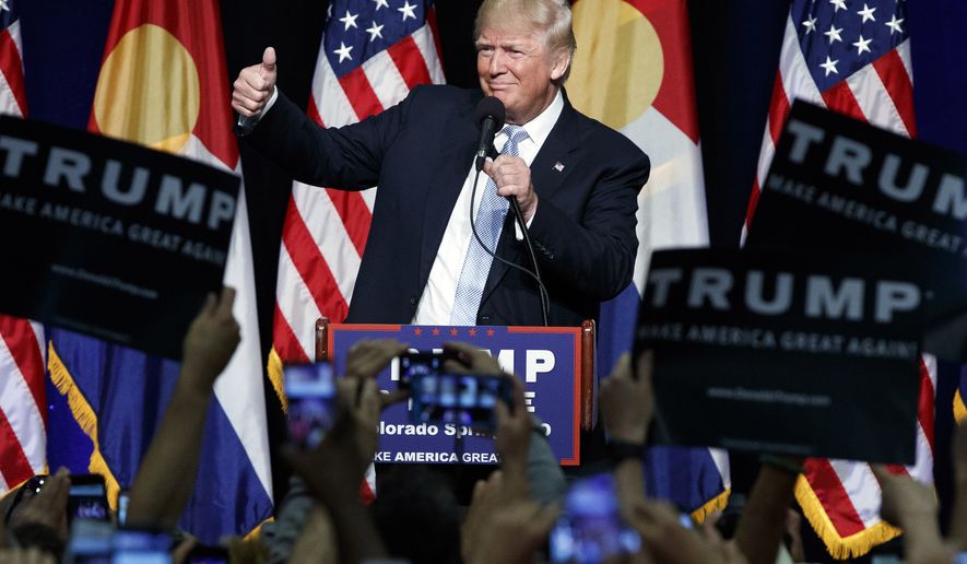 Republican presidential candidate Donald Trump gives a thumbs up as he speaks during a campaign rally, Friday, July 29, 2016, in Colorado Springs, Colo. (AP Photo/Evan Vucci)