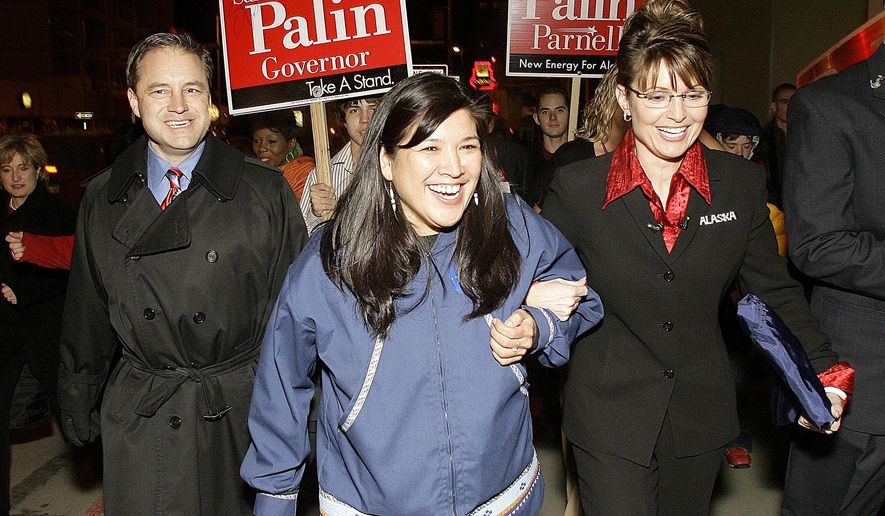 FILE- This Nov. 7, 2006 file photo shows Sarah Palin, right, walking with Paulette Schuerch of Kotzebue, Alaska, and Sean Parnell, left, to Election Central headquarters in Anchorage, Alaska, after Palin was declared the winner of the Alaska governor&#x27;s race. The election night tradition in Alaska of candidates of all parties milling about at Election Central awaiting election results or going there for media interviews has ended. State election officials, looking for places to cut back, have said they will not be renting a convention center in Anchorage for the 2016 primary and general election watch parties, citing the cost and questioning the state’s continued role in the event at a time when results can now be easily accessed online. (AP Photo/Al Grillo, File)