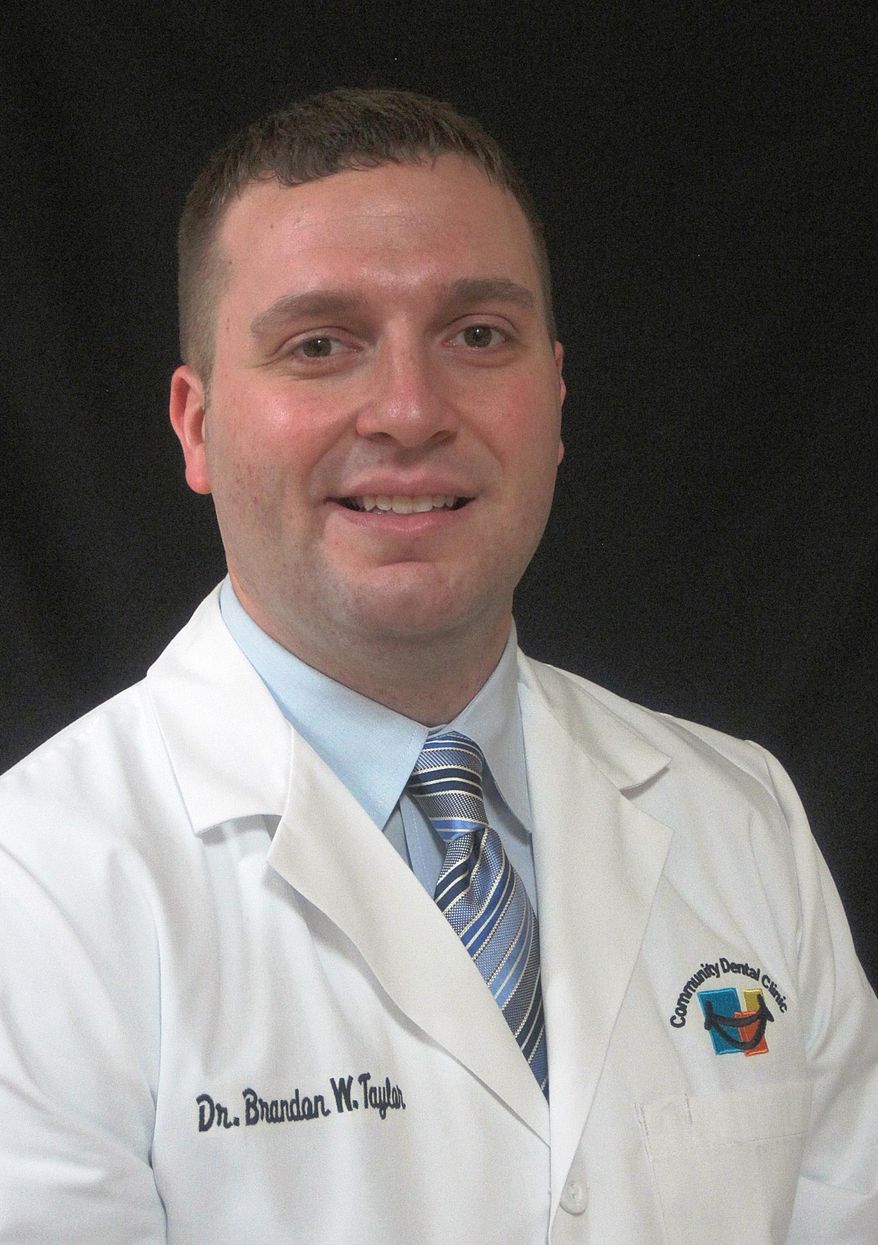 In this March 1, 2013 provided by Brandon Taylor shows himself in Owensboro, K.Y. Kentucky Gov. Matt Bevin seeks to overhaul the state's Medicaid system. The proposal would eliminate routine dental and vision coverage for Medicaid recipients. Dr. Taylor, runs a dental clinic in Deviess county and is the only that accepts Medicaid. (Brandon Taylor via AP)