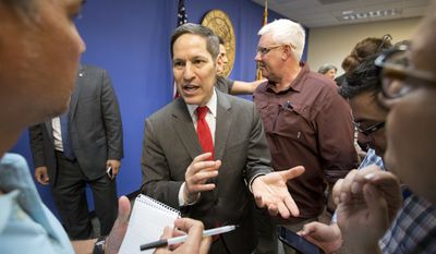 Centers for Disease Control and Prevention Director Dr. Tom Frieden, center, gestures as he speaks with members of the media after a news conference, Thursday, Aug. 4, 2016, in Doral, Fla. The CDC has warned expectant mothers to steer clear of the city&#39;s Wynwood neighborhood, where at least 15 people are believed to have been infected with the Zika virus through mosquito bites in the first such cases on record in the mainland U.S. (AP Photo/Wilfredo Lee)