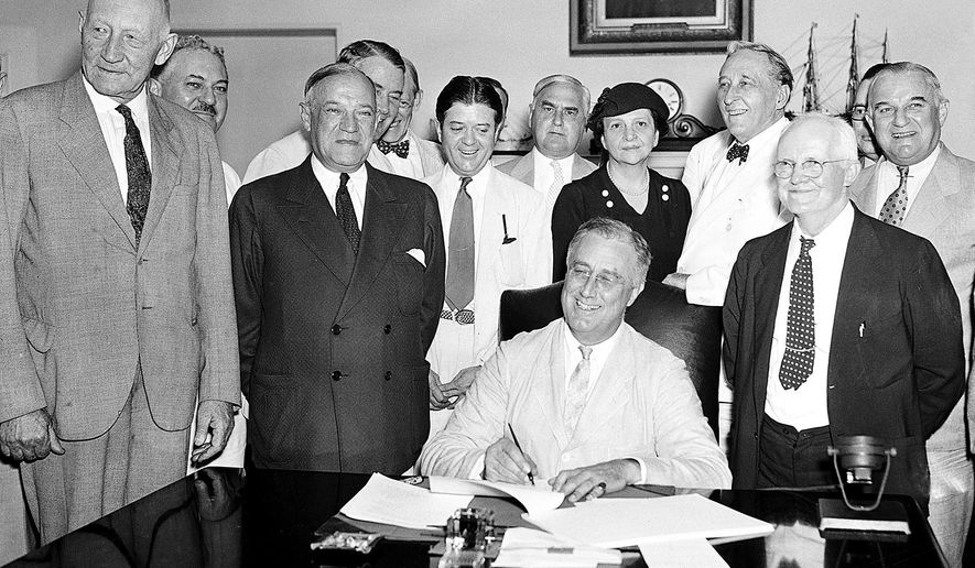 FLE - In this Aug. 14, 1935, file photo President Franklin Roosevelt signs the Social Security bill in Washington. Americans are getting older, but not this old: Social Security records show that 6.5 million people in the U.S. have reached the ripe old age of 112. In reality, only few could possibly be alive. As of last fall, there were only 42 people known to be that old in the entire world. But Social Security does not have death records for millions of people with birth dates stretching back as far as 1869, according to a report by the agency’s inspector general. The first old-age monthly benefit check was paid in 1940, after President Franklin D. Roosevelt had signed the Social Security Act in 1935. (AP Photo, File)