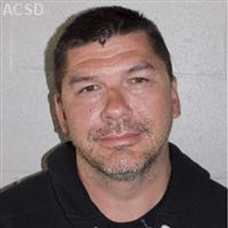 In this Thursday, Aug. 4, 2016, booking mug released by the Amador County Sheriff's Office is Anthony Silva, the mayor of Stockton, Calif. A lawyer says Silva has been charged with providing alcohol to minors last summer at a youth camp he runs. Attorney Mark Reichel, who represents Mayor Silva, said his client was charged Thursday in Amador County with eavesdropping, contributing to the delinquency or a minor, providing alcohol to a minor and cruelty to a child by endangering health. (Amador County Sheriff's Office via AP)