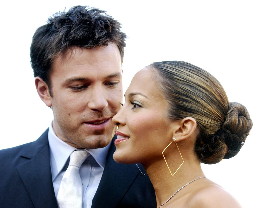 "Daredevil" star Ben Affleck and his fiancee', actress/singer Jennifer Lopez, arrive at the premiere of the film in the Westwood section of Los Angeles, Sunday, Feb. 9, 2003. (AP Photo/Chris Pizzello)