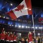 Rosannagh Maclennan carries the flag of Canada during the opening ceremony for the 2016 Summer Olympics in Rio de Janeiro, Brazil, Friday, Aug. 5, 2016. (AP Photo/David J. Phillip) ** FILE **