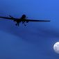 In this Jan. 31, 2010, file photo, an unmanned U.S. Predator drone flies over Kandahar Air Field, southern Afghanistan, on a moon-lit night. The White House has a released a version of President Barack Obama’s three-year-old directive on the use of lethal force against terrorists overseas, laying out what it says are safeguards to minimize civilian deaths and errant strikes while preserving the capability to take quick action with drone attacks and other means.(AP Photo/Kirsty Wigglesworth, File)
