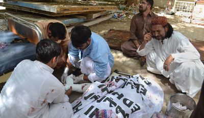 A Pakistani man mourns the death of a family member who was killed in a bomb blast, in Quetta, Pakistan, Monday, Aug. 8, 2016. A powerful bomb went off inside a government-run hospital in the southwestern city of Quetta on Monday, killing dozens of people and wounding dozens of others, police said. (AP Photo/Arshad Butt)