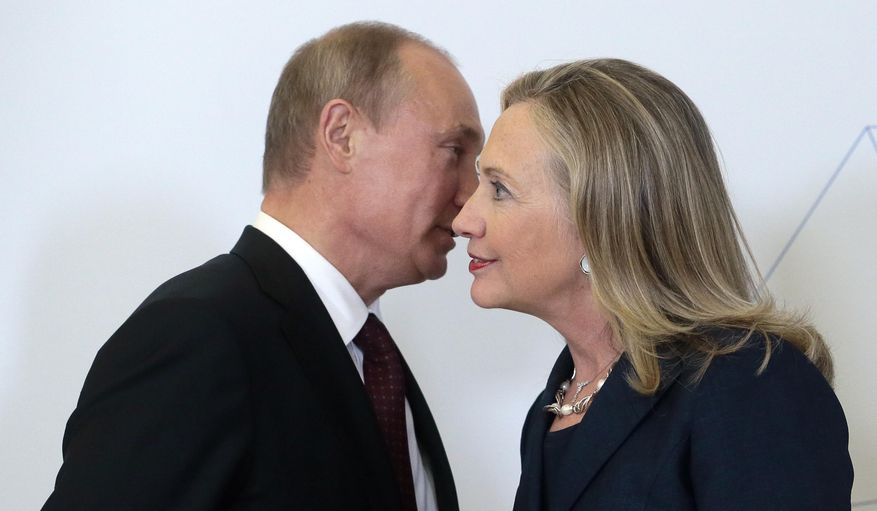 FILE - In this Sept. 8, 2012 pool-file photo, Russian President Vladimir Putin meets with then-Secretary of State Hillary Clinton in Vladivostok, Russia. Clinton says as president she will stand up to Putin. As secretary of state, her wrangles with Russia had mixed results. Clinton, the public face of President Barack Obama's first-term "reset" policy with Russia, scored a number of diplomatic successes _ when Dmitry Medvedev was president. When Putin reclaimed the presidency, it was a different story. (AP Photo/Mikhail Metzel, Pool, File)