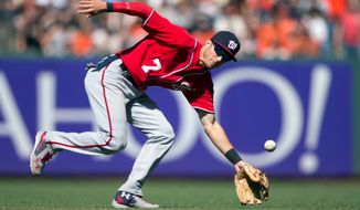 Washington Nationals&#39; Trea Turner can&#39;t get a glove on a ball hit by San Francisco Giants&#39; Trevor Brown for a single during the eighth inning of a baseball game Sunday, July 31, 2016, in San Francisco. The Giants won 3-1. (AP Photo/D. Ross Cameron)