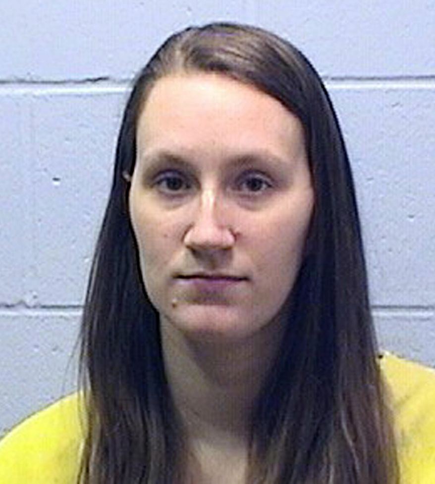 This undated photo provided by Illinois Department of Corrections shows Danielle Fischer, now known as Danielle Bagley. Bagley who is in prison for her son's death will have an October trial to determine if she will keep custody of a daughter born after she was incarcerated. An Oct. 25 trial is scheduled on the state's request to terminate Danielle Bagley and husband Kam Bagley's custody rights. Danielle Bagley pleaded guilty in December to child endangerment in connection with the death of her 3-year-old son. (llinois Department of Corrections via AP)