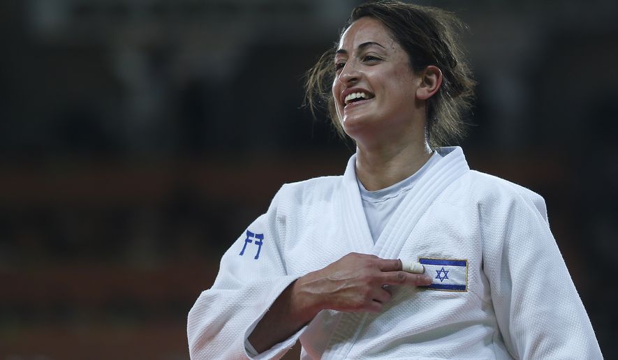 Israel&#x27;s Yarden Gerbi reacts after winning the bronze medal of the women&#x27;s 63 kg judo competition at the Rio 2016 Olympics Games in Rio de Janeiro on Tuesday. (Rex Features via Associated Press)