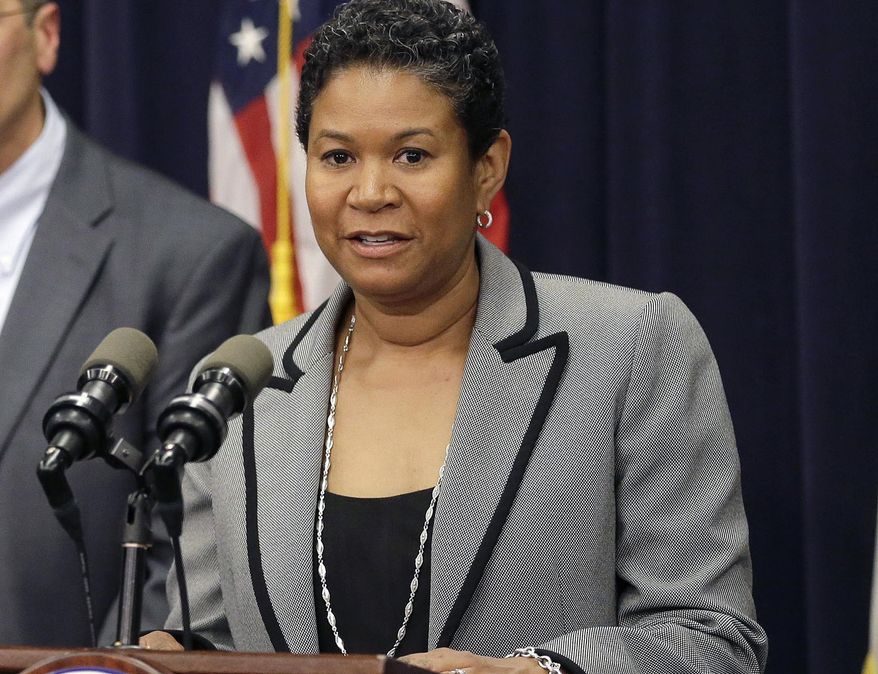 FILE - In this June 14, 2016 file photo, Massachusetts Superior Court judge Kimberly Budd speaks during a news conference at the Statehouse in Boston after Gov. Charlie Baker nominated her to the state's Supreme Judicial Court. The Governor's Council is expected to vote Wednesday, Aug. 10, 2016, on Budd's nomination. (AP Photo/Steven Senne, File)