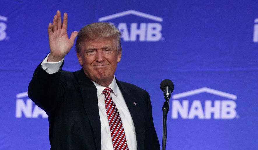 Republican presidential candidate Donald Trump waves after speaking to the National Association of Home Builders, Thursday, Aug. 11, 2016, in Miami Beach, Fla. (AP Photo/Evan Vucci)