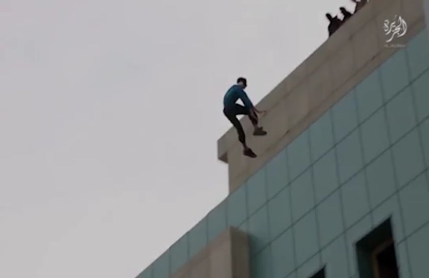 A new video purportedly released by the Islamic State terrorist group showed a man accused of "homosexual acts" being pushed off the roof of a tall building as children watched.