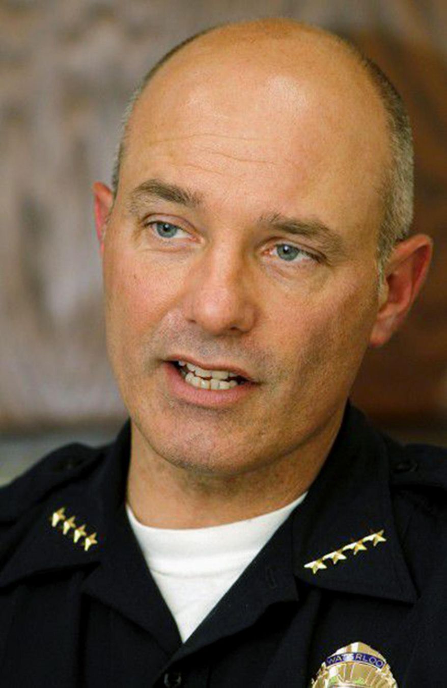 This undated photo shows Waterloo Chief of Police Daniel Trelka in Waterloo, Iowa. Waterloo, the city with Iowa's highest black population has settled lawsuits against white officers who roughed up three black residents, including a 13-year-old girl who was handcuffed after yelling at a passing officer to "slow down." Trelka said officers made "honest mistakes" due to deficient training. He said officers have been instructed to stop arresting people who won't give their names, a practice that is illegal absent additional criminal activity. (The Courier via AP)