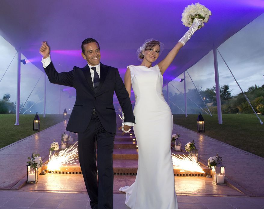 This Saturday, Aug. 6, 2016 photo shows former Los Angeles Mayor Antonio Villaraigosa during his wedding to Patricia Govea at a private ceremony and reception in San Miguel de Allende, Mexico. Villaraigosa, a potential candidate for governor, tied the knot with Govea in a ceremony in central Mexico, with about 100 friends and family in attendance. (Armando Arorizo/WeddingVignette.com via AP)