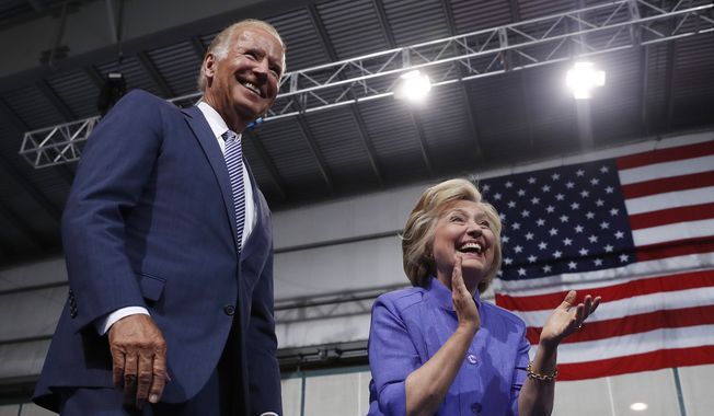 Democratic presidential candidate Hillary Clinton and Vice President Joe Biden arrive at a campaign event at Riverfront Sports in Scranton, Pa., Monday, Aug. 15, 2016. (AP Photo/Carolyn Kaster)