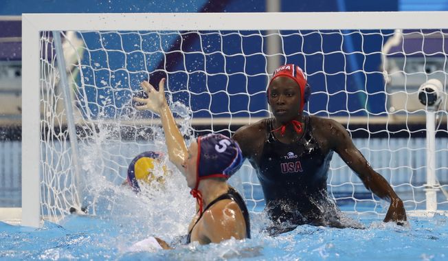 United States&#x27; Ashleigh Johnson makes a save during their women&#x27;s water polo quarterfinal match against Brazil at the 2016 Summer Olympics in Rio de Janeiro, Brazil, Monday, Aug. 15, 2016. (AP Photo/Sergei Grits)