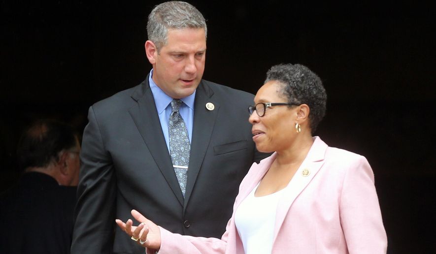 Tim Ryan and Congresswoman Marcia Fudge talk after the memorial service for former Ohio Congressman Steve LaTourette at the University Circle United Methodist Church Monday, Aug. 15, 2016, in Cleveland, Oio. LaTourette died Aug. 3, 2016, after a battle with leukemia. (Gus Chan /The Plain Dealer via AP) **FILE**