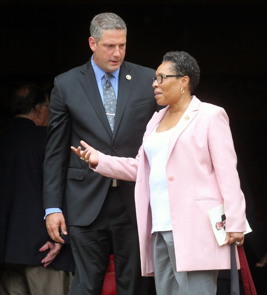 Tim Ryan and Congresswoman Marcia Fudge talk after the memorial service for former Ohio Congressman Steve LaTourette at the University Circle United Methodist Church Monday, Aug. 15, 2016, in Cleveland, Oio. LaTourette died Aug. 3, 2016, after a battle with leukemia. (Gus Chan /The Plain Dealer via AP) **FILE**