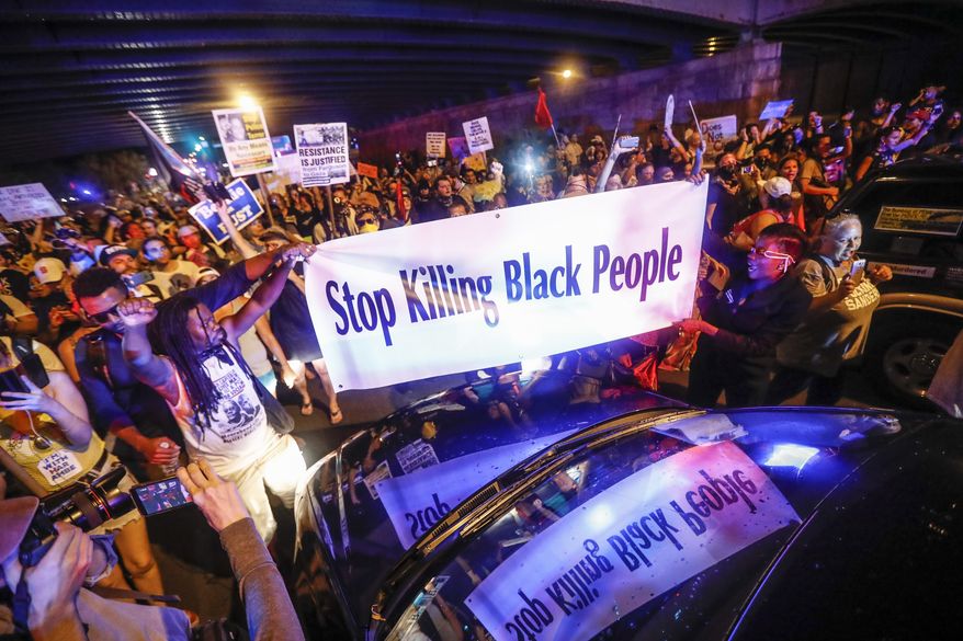 Black Lives Matter demonstrators gather during a protest on Broad Street in Philadelphia on July 26, 2016, during the second day of the Democratic National Convention. (Associated Press)