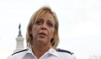 In this Oct. 3, 2013, file photo, Washington Police Chief Cathy Lanier speaks on Capitol Hill in Washington. Lanier is stepping down to become head of security for the National Football League. The police department announced Lanier&#39;s departure Tuesday, Aug. 16, 2016, on Twitter. Lanier said in a letter to the department&#39;s 3,700 officers that she is taking the job at the NFL.  (AP Photo/Molly Riley, File)