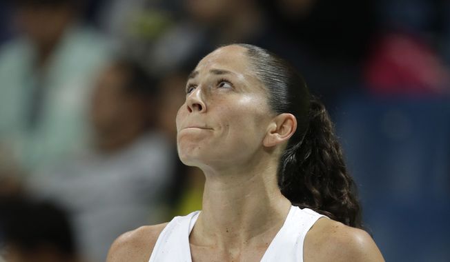 United States&#x27; Sue Bird sits on the bench after a fall during a women&#x27;s quarterfinal round basketball game against Japan at the 2016 Summer Olympics in Rio de Janeiro, Brazil, Tuesday, Aug. 16, 2016. (AP Photo/Eric Gay)