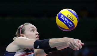 United States&#39; Kayla Banwarth bumps during a women&#39;s quarterfinal volleyball match against Japan at the 2016 Summer Olympics in Rio de Janeiro, Brazil, Tuesday, Aug. 16, 2016. (AP Photo/Jeff Roberson)