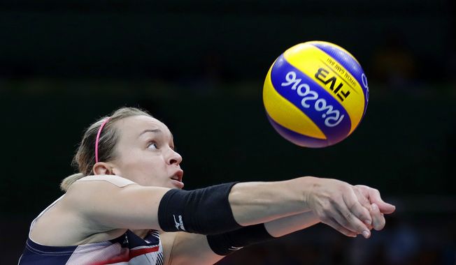 United States&#x27; Kayla Banwarth bumps during a women&#x27;s quarterfinal volleyball match against Japan at the 2016 Summer Olympics in Rio de Janeiro, Brazil, Tuesday, Aug. 16, 2016. (AP Photo/Jeff Roberson)