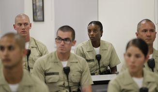 In this Tuesday, July 19, 2016, photo, Los Angeles County sheriff&#39;s deputy recruit Renata Phillip, third from right, listens to a lecture in a classroom at the Biscailuz Regional Training Center in Monterey Park, Calif. Phillip is one of just two black women in her class of 84 recruits. More than half are men and most are white or Hispanic.Only three recruits out of every 100 will make it to graduation, said Capt. Scott Gage, who&#39;s in charge of training at the Los Angeles County Sheriff&#39;s Department.  (AP Photo/Jae C. Hong)