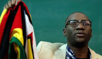 Pastor Evan Mawarire told the Atlantic Council on Wednesday that Zimbabweans have run out of patience with President Robert Mugabe. (Associated Press)