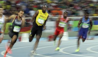 Canada&#39;s Andre De Grasse, Jamaica&#39;s Usain Bolt, Bahrain&#39;s Salem Eid Yaqoob and United States&#39; Ameer Webb, from left, compete in a men&#39;s 200-meter semifinal during the athletics competitions of the 2016 Summer Olympics at the Olympic stadium in Rio de Janeiro, Brazil, Wednesday, Aug. 17, 2016. (AP Photo/Charlie Riedel)