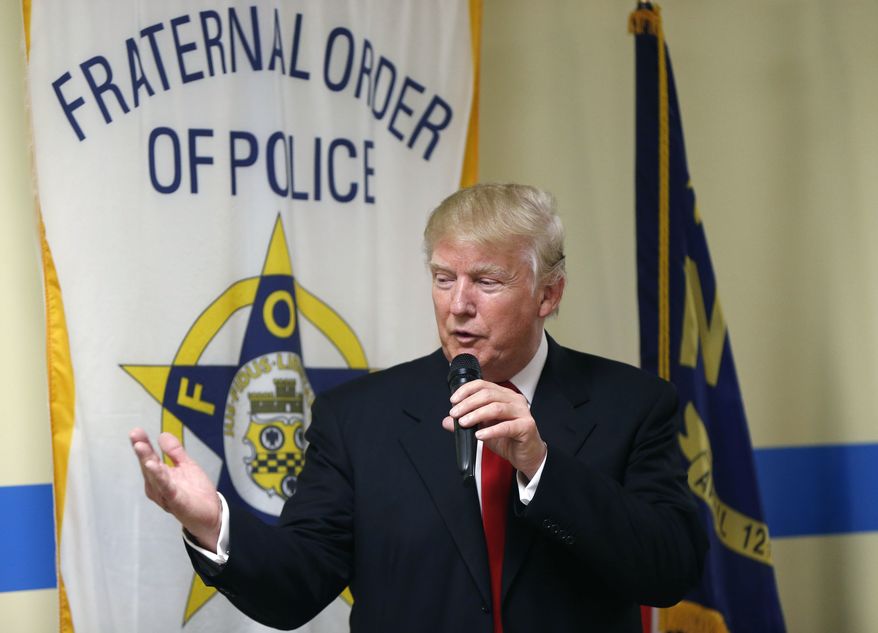 Republican presidential candidate Donald Trump speaks to retired and active law enforcement personnel at a Fraternal Order of Police lodge during a campaign stop in Statesville, N.C., Thursday, Aug. 18, 2016. (AP Photo/Gerald Herbert) ** FILE **