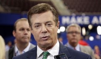 FILE - In this July 17, 2016 file photo, Trump Campaign Chairman Paul Manafort talks to reporters on the floor of the Republican National Convention at Quicken Loans Arena, Sunday, in Cleveland.  (AP Photo/Matt Rourke, File) **FILE**