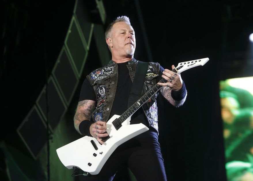 FILE - In this May 9, 2015 file photo, James Hetfield of Metllica performs at Rock in Rio USA in Las Vegas. The band announced Thursday its releasing its first album in eight years. "Hardwired ... To Self-Destruct" will feature 80 minutes of music from the veteran heavy metal group. The album is scheduled for release Nov. 18. (Photo by John Davisson/Invision/AP, File)