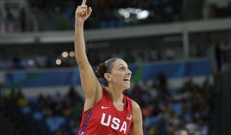 United States&#39; Diana Taurasi celebrates a score against France during a women&#39;s semifinal round basketball game at the 2016 Summer Olympics in Rio de Janeiro, Brazil, Thursday, Aug. 18, 2016. (AP Photo/Eric Gay)