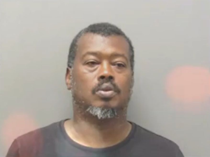 Clarence Eugene Reed (pictured here), 47, and Jennifer Diane Denen, 30, were charged Friday after allegedly zip-tying a 4-year-old girl to furniture as punishment and verbally abusing her to the point that she believed her name was "idiot," police said. (Hot Springs Police Department via KARK)