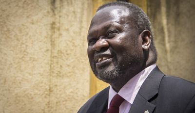 FILE--- In this file photo of Monday, Aug. 31, 2015. South Sudan&#39;s rebel leader Riek Machar.  Sudan&#39;s rebel leader Machar  has fled the country, a spokesman for his party said Thursday Aug. 18. 2016 . The former First Vice President Riek Machar has gone to a safe country in the neighboring East African region, Mabior Garang, a spokesperson for the SPLM-IO party, said in a posting on Facebook..(Photo/Mulugeta Ayene-file)