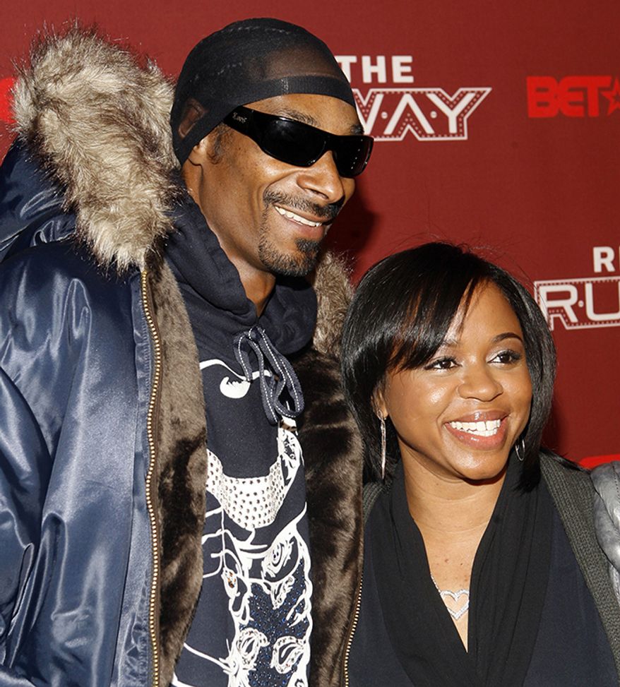 Snoop Dogg married his high school sweetheart, Shante Taylor, on June 12, 1997. On May 21, 2004, he filed for divorce from Taylor, citing irreconcilable differences. The couple renewed their wedding vows on January 12, 2008. The couple have three children together: sons Cordé and Cordell , and daughter Cori. (AP Photo)