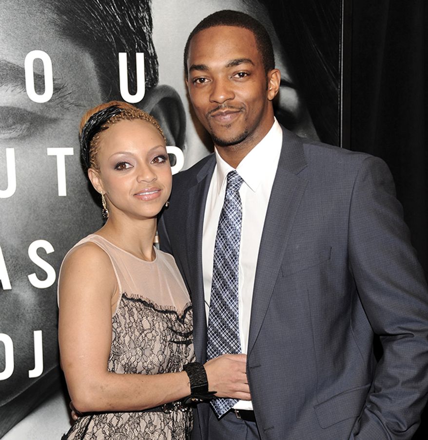 Actor Anthony Mackie and his longtime girlfriend, Sheletta Chapital, married in December 2014. The two first met in grade school when they were seven years old. (AP Photo)