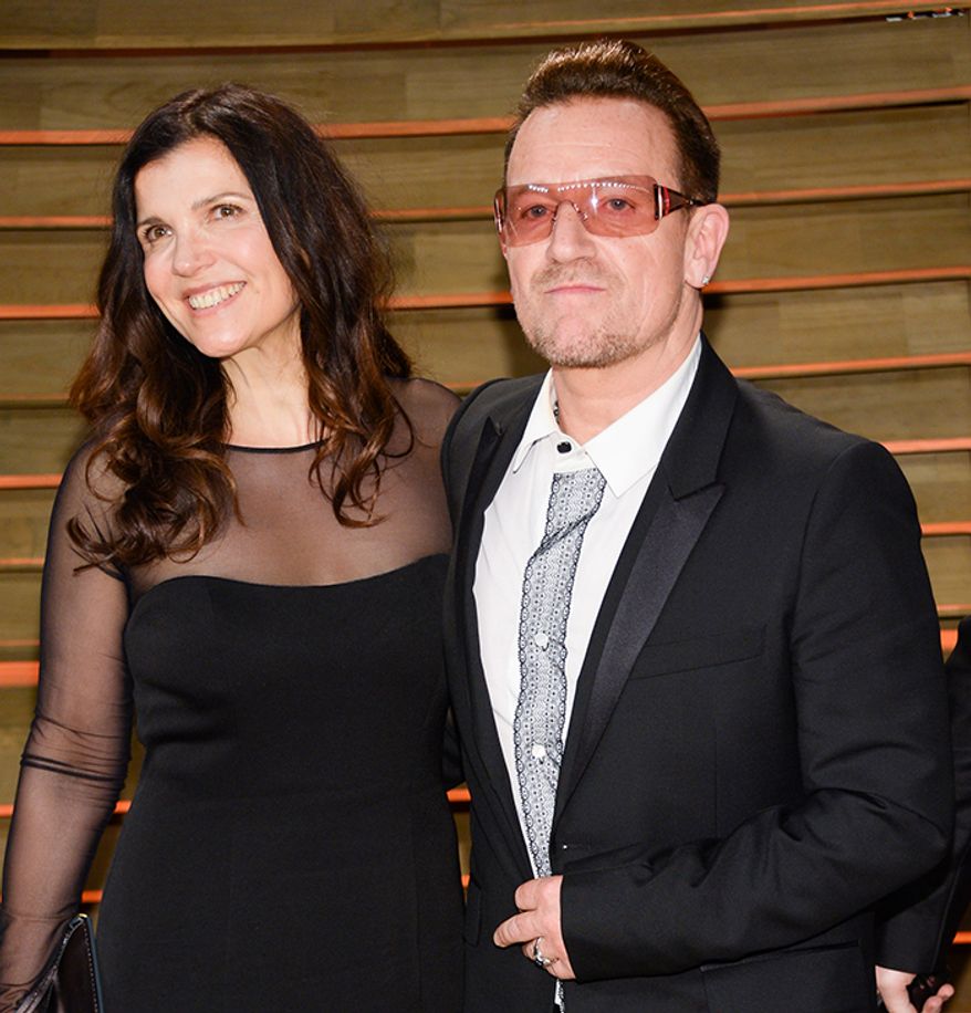 U2 front man Bono met Ali Stewart when they were attending Mount Temple Comprehensive School in Dublin, Ireland. The couple married on August 21, 1982 when Bono was 22 and Stewart was 21 (AP Photo)
