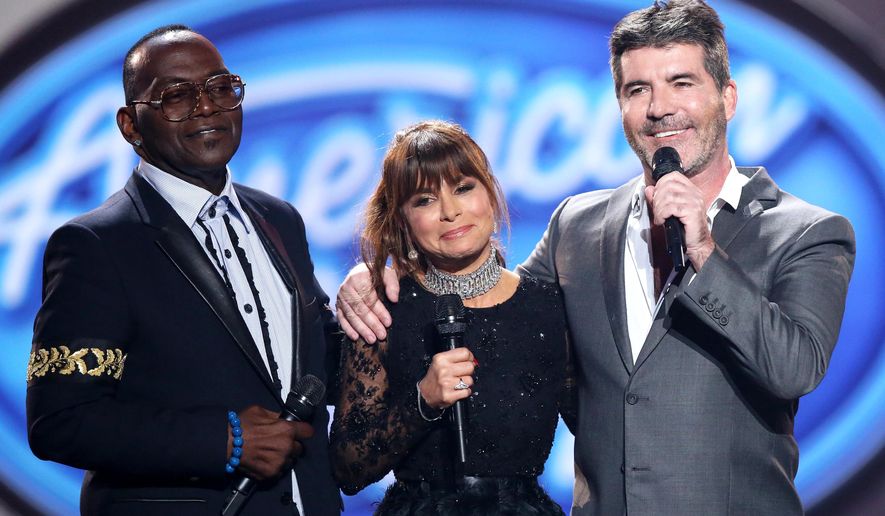 In this April 7, 2016 file photo, former judges Randy Jackson, from left, Paula Abdul, and Simon Cowell appear at the "American Idol" farewell season finale in Los Angeles. On May 9, 2017, ABC executives announced they were bringing the defunct singing competition back to life on the Disney-owned network. (Photo by Matt Sayles/Invision/AP, File) **FILE**