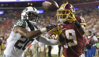 New York Jets cornerback Marcus Williams (20) can&#39;t stop a touchdown catch by Washington Redskins wide receiver Rashad Ross (19) during the first half of an NFL preseason football game Friday, Aug. 19, 2016, in Landover, Md. (AP Photo/Nick Wass) ** FILE **