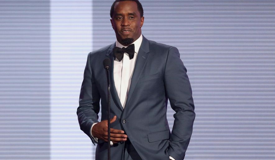 FILE - In this Nov. 22, 2015 file photo, Sean &amp;quot;Diddy&amp;quot; Combs presents the award for best collaboration of the year at the American Music Awards at the Microsoft Theater in Los Angeles. Combs will be kicking off his tour later than expected after undergoing surgery for a shoulder injury. The rapper and business mogul announced Friday, Aug. 19, 2016, that his Bad Boy Family Reunion Tour will now begin Sept. 1 in Chicago to give him more time to recover from surgery. (Photo by Matt Sayles/Invision/AP, File)
