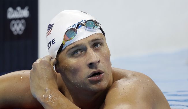 FILE - In this Tuesday, Aug. 9, 2016, file photo, United States&#x27; Ryan Lochte checks his time in a men&#x27;s 4x200-meter freestyle heat during the swimming competitions at the 2016 Summer Olympics, in Rio de Janeiro, Brazil. (AP Photo/Michael Sohn, File) **FILE**