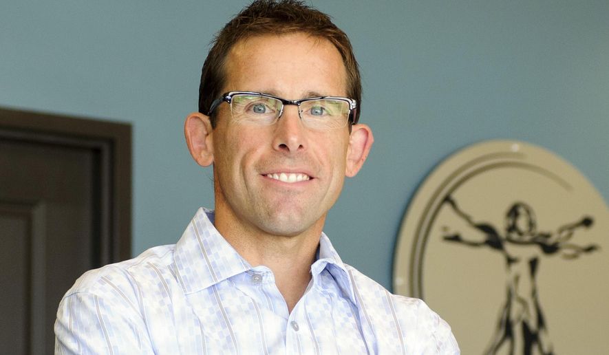 FOR RELEASE SATURDAY, AUGUST 20, 2016, AT 12:01 A.M. CDT.- Dr. Todd Johnson on Tuesday, Aug. 2, 2016, at Access Family Medicine in Lincoln, Neb. The new practice, the first in Nebraska that relies on monthly membership dues and does not take insurance. (Matt Ryerson/The Journal-Star via AP)