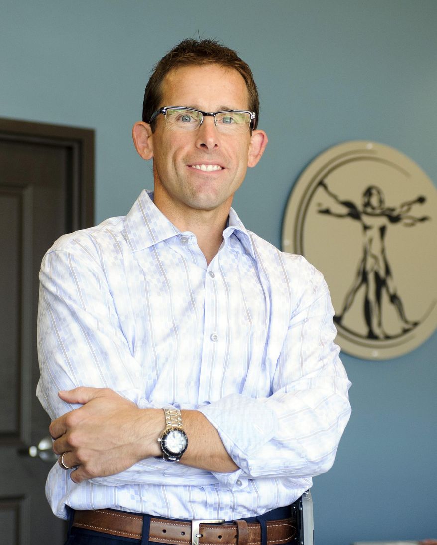 FOR RELEASE SATURDAY, AUGUST 20, 2016, AT 12:01 A.M. CDT.- Dr. Todd Johnson on Tuesday, Aug. 2, 2016, at Access Family Medicine in Lincoln, Neb. The new practice, the first in Nebraska that relies on monthly membership dues and does not take insurance. (Matt Ryerson/The Journal-Star via AP)