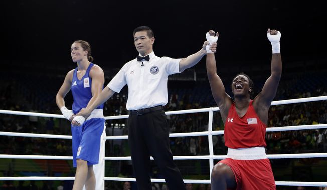 United States&#x27; Claressa Maria Shields, right, reacts as she won her gold medal for the women&#x27;s middleweight 75-kg boxing against Netherlands&#x27; Nouchka Fontijn at the 2016 Summer Olympics in Rio de Janeiro, Brazil, Sunday, Aug. 21, 2016. (AP Photo/Frank Franklin II)