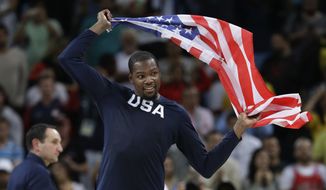 United States&#39; Kevin Durant (5) celebrates winning the men&#39;s basketball gold medal at the 2016 Summer Olympics in Rio de Janeiro, Brazil, Sunday, Aug. 21, 2016. (AP Photo/Eric Gay)