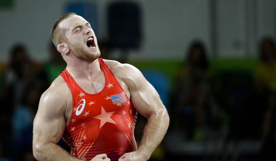 United States&#39; Kyle Frederick Snyder reacts after defeating Georgia&#39;s Elizbar Odikadze during the men&#39;s 97-kg freestyle wrestling competition at the 2016 Summer Olympics in Rio de Janeiro, Brazil, Sunday, Aug. 21, 2016. (AP Photo/Markus Schreiber)